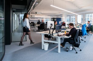 Modern team working in an office environment, representing a future-focused and evolving way of working Modern team working in an office environment, representing a future-focused and evolving way of working