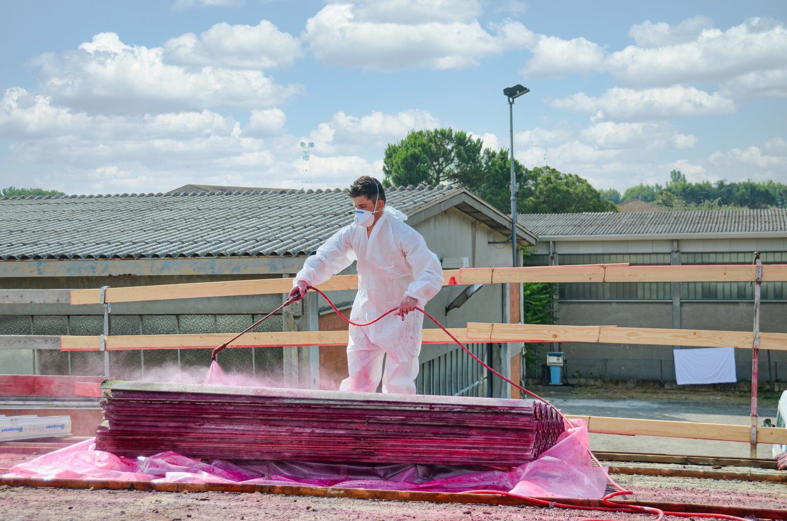a man spray painting